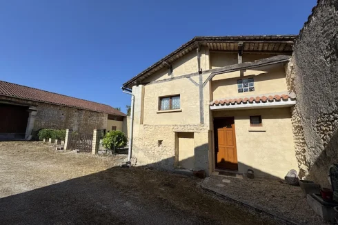 Pretty stone cottage with barn and garden