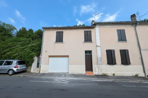 Front view of the house and garage