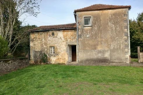 Side facade showing original house