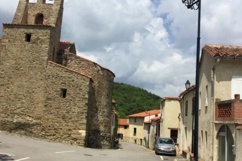 main street showing church on left and my house on right