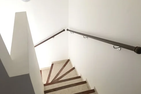 The stairs which lead to the upper floor
