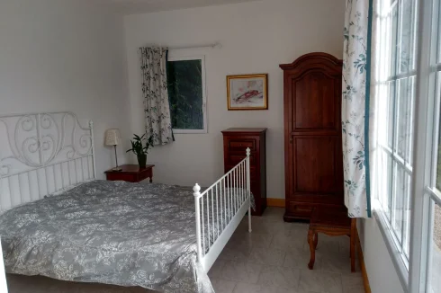 One of the three bright double bedrooms, all of which have ensuite w/c shower