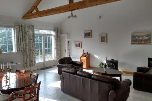 Spacious interior with high ceilings and exposed beams
