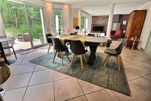 Open plan kitchen dining area looking onto the living area