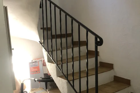 Stairs leading to upstairs bedrooms