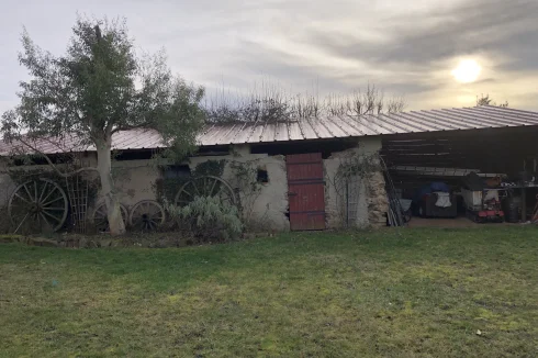 rear outbuildings and car port