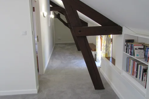 Main house.  Corridor between bedrooms.