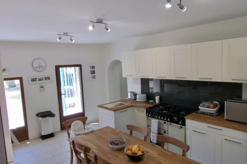 Main house.  Kitchen with dining area for 6.