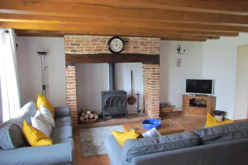 Cottage.  Living room with wood burner.