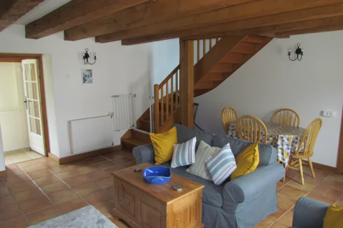 Cottage.  Living room and indoor dining area.