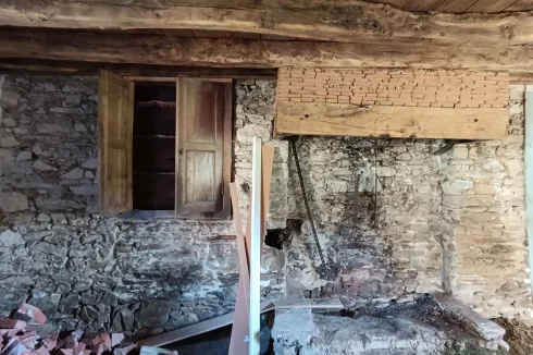 Old house fireplace and cupboard in lounge