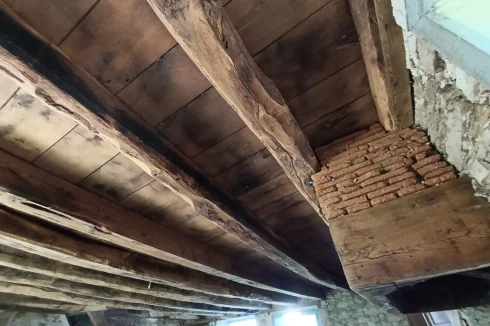 Old house lounge fireplace and ceiling