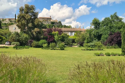 House with village behind