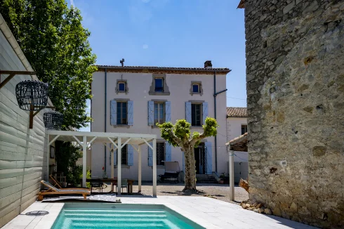 Main residence heated swimming pool with electric cover