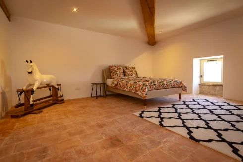 Main residence bedroom 5 with original terracotta tiles