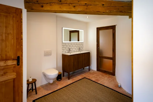 Main residence shower room with original terracotta tiles