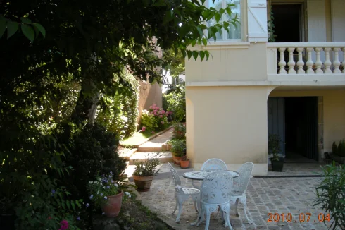 rear of house with paved terrace