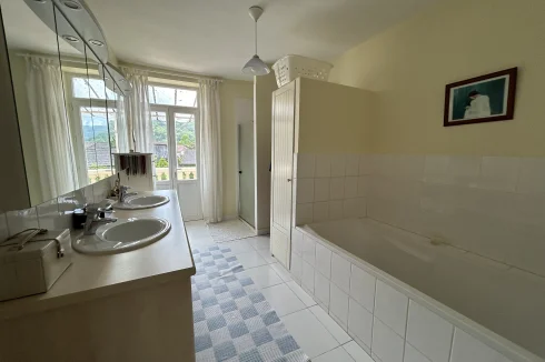 family bathroom with bathtub and separate shower cubicle