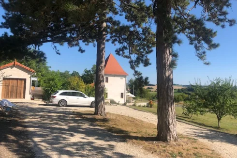 Driveway, garage and house