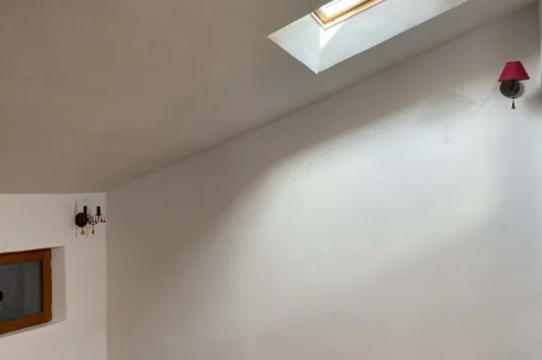 Bedroom with mezzanine and bathroom