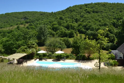 the green hills all around