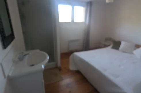 2nd bedroom shower and sink view