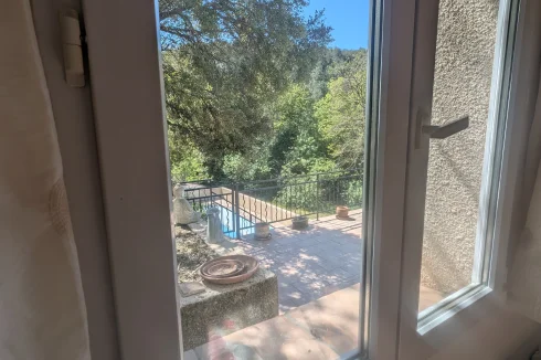 Twin room view overlooking the terrace and pool