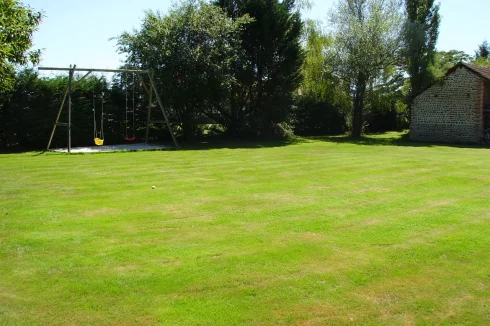 Beautiful, flat, and fenced plot of land