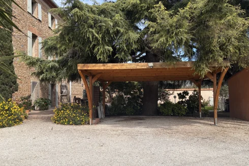 The carport of the gravel "yard"