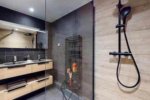 Walk-in shower, stone sink
