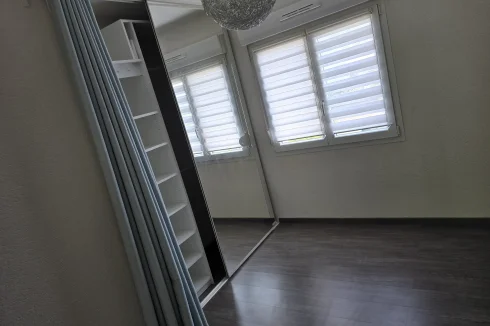 one of the rooms with integrated wardrobes