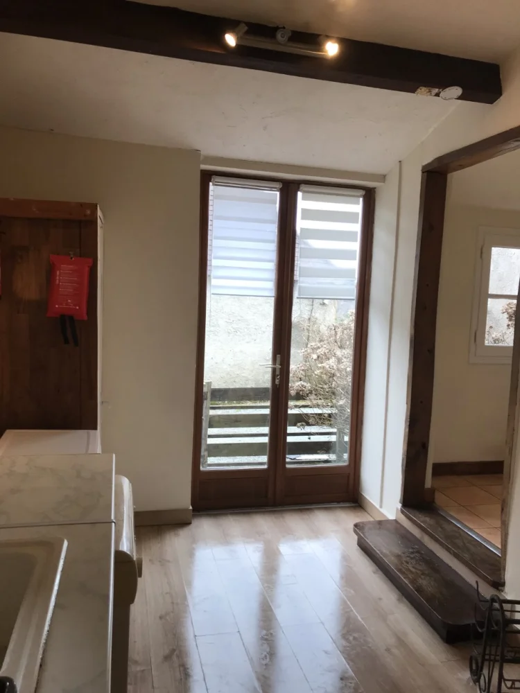 Kitchen with doors to courtyard